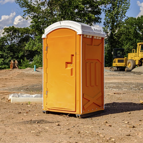 what is the cost difference between standard and deluxe portable restroom rentals in Colton